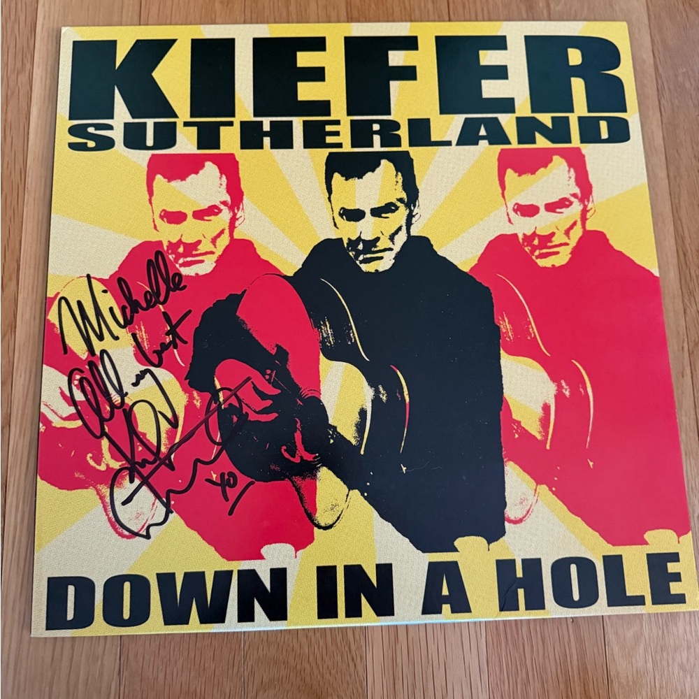 Autographed Kiefer Sutherland Down in a Hole album. Never used. NWT